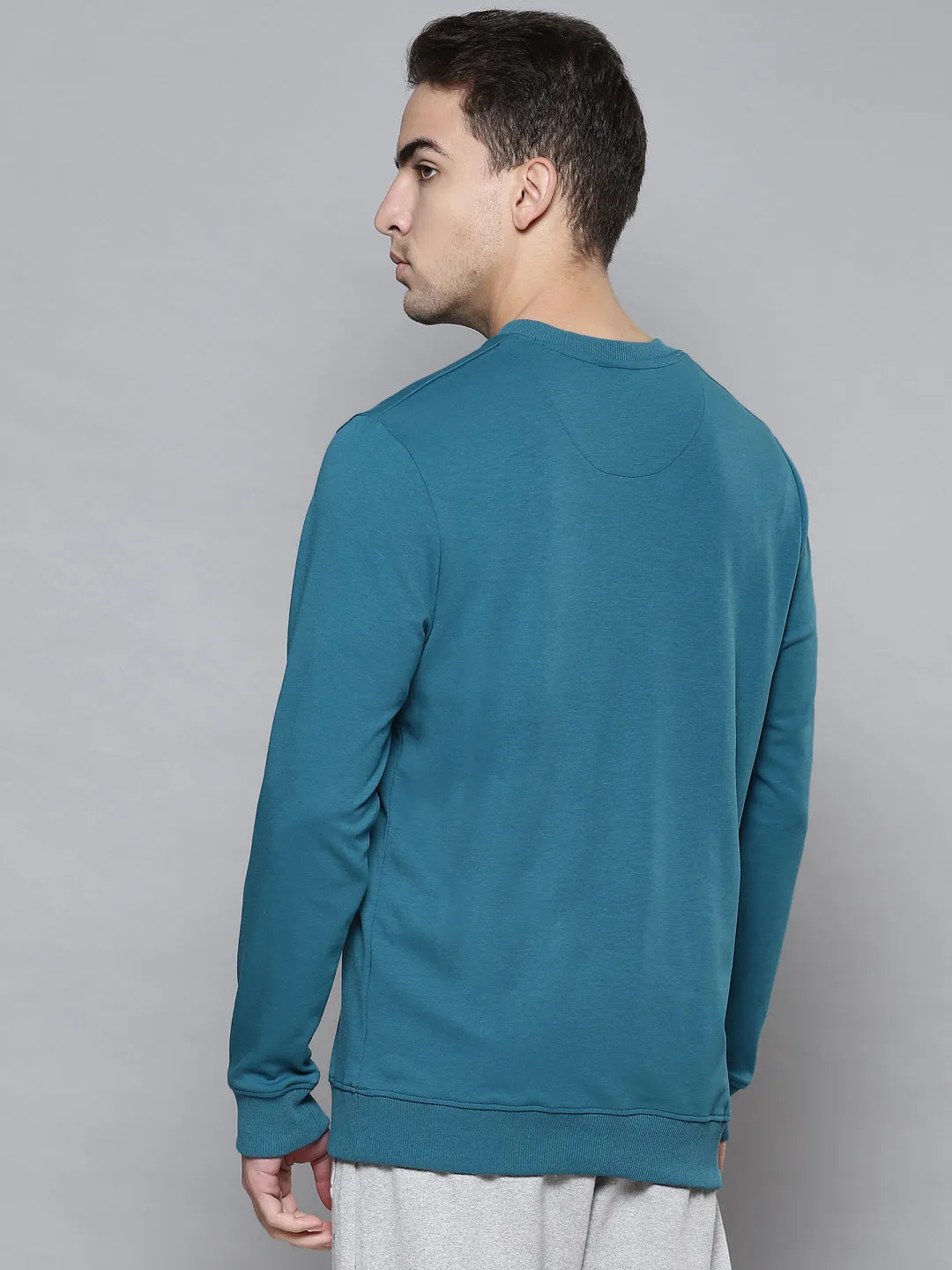 Alcis Men Teal Blue Solid Round Neck Sweatshirt