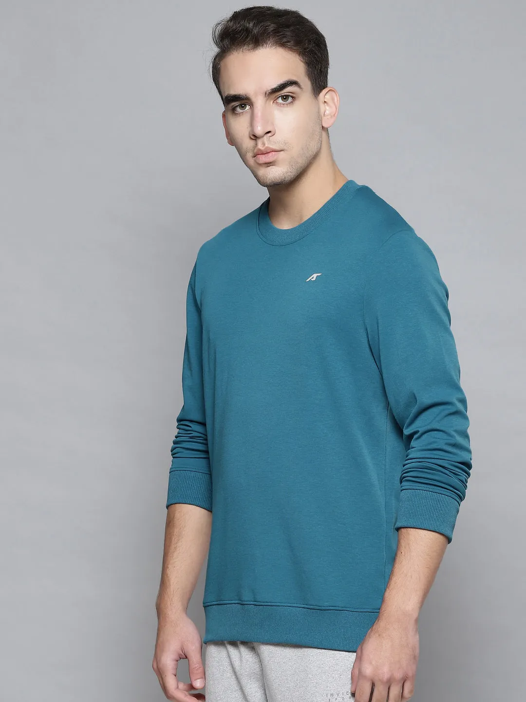 Alcis Men Teal Blue Solid Round Neck Sweatshirt