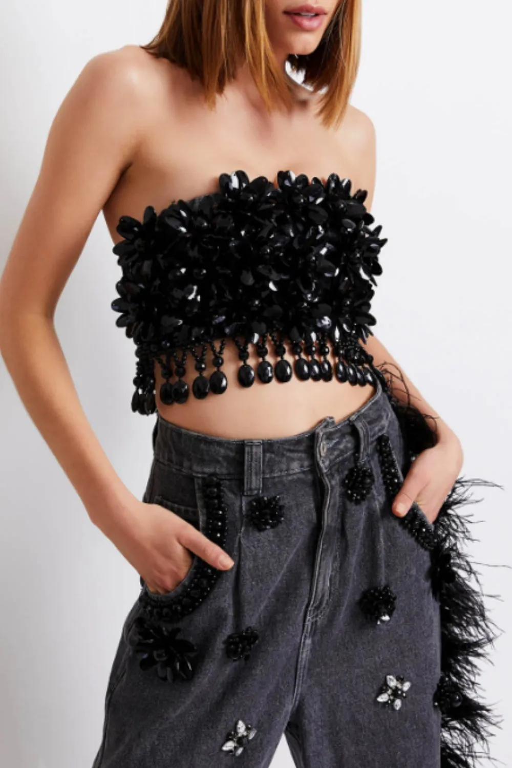 HAND BEADED JEANS WITH FEATHER TRIM