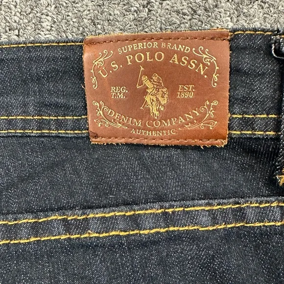 U.S Polo Assn dark denim gold embroidered polo player &amp; 3 on back pockets sz 14