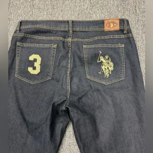 U.S Polo Assn dark denim gold embroidered polo player &amp; 3 on back pockets sz 14